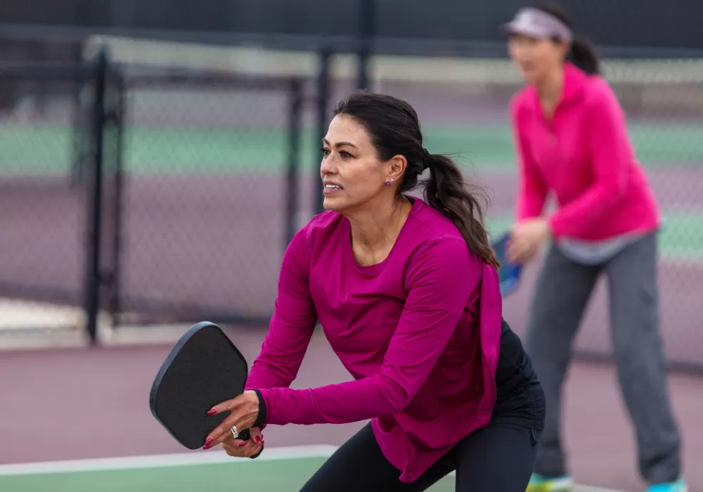 Woman playing Pickleball