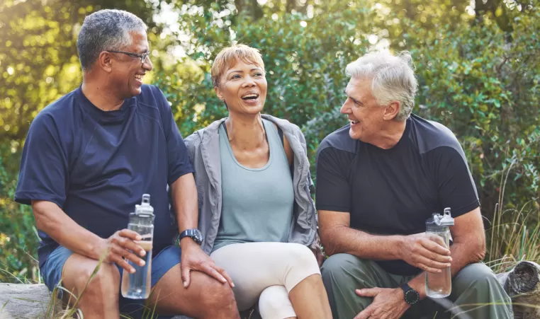 3 friends talking and drinking water