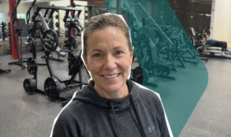 Woman smiling in the YMCA fitness center