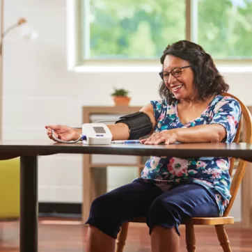 Woman checking her blood pressure