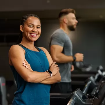 smiling woman on a treadmill