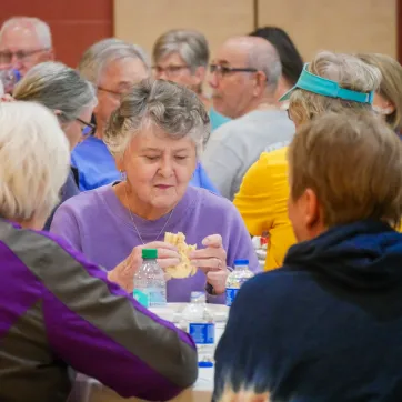 senior women enjoying a meal together